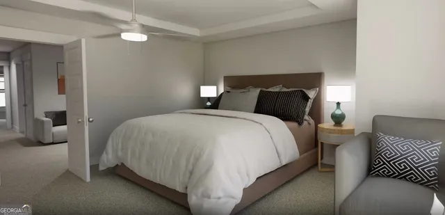 a bedroom with a bed and a lamp