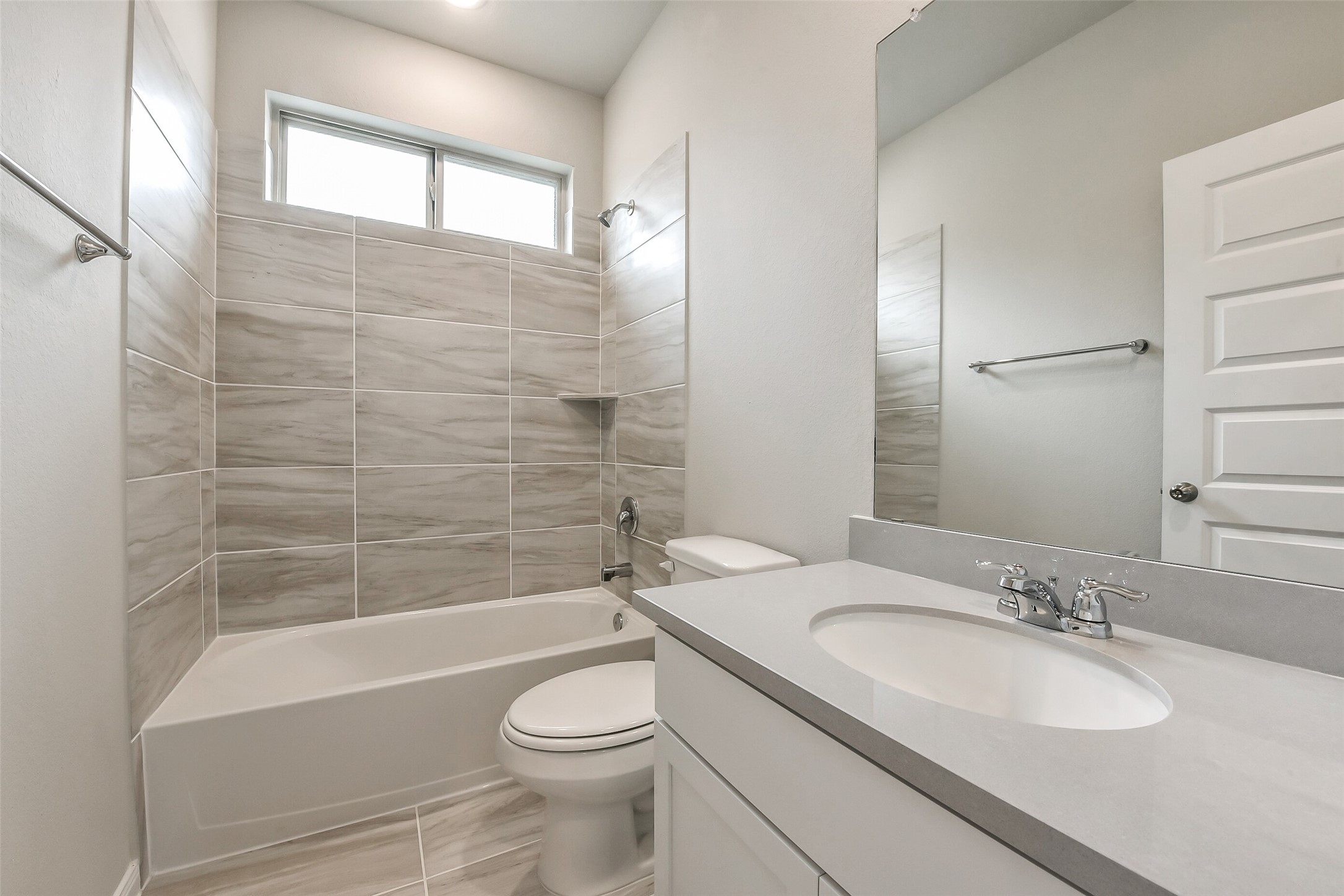 4318 Wind Swell Lane Houston, TX 77053 - Photo 34 of 39 a bathroom with a granite countertop sink toilet and shower