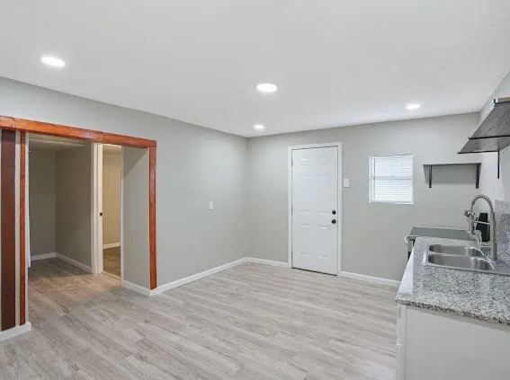 a view of a kitchen cabinets a sink and dishwasher