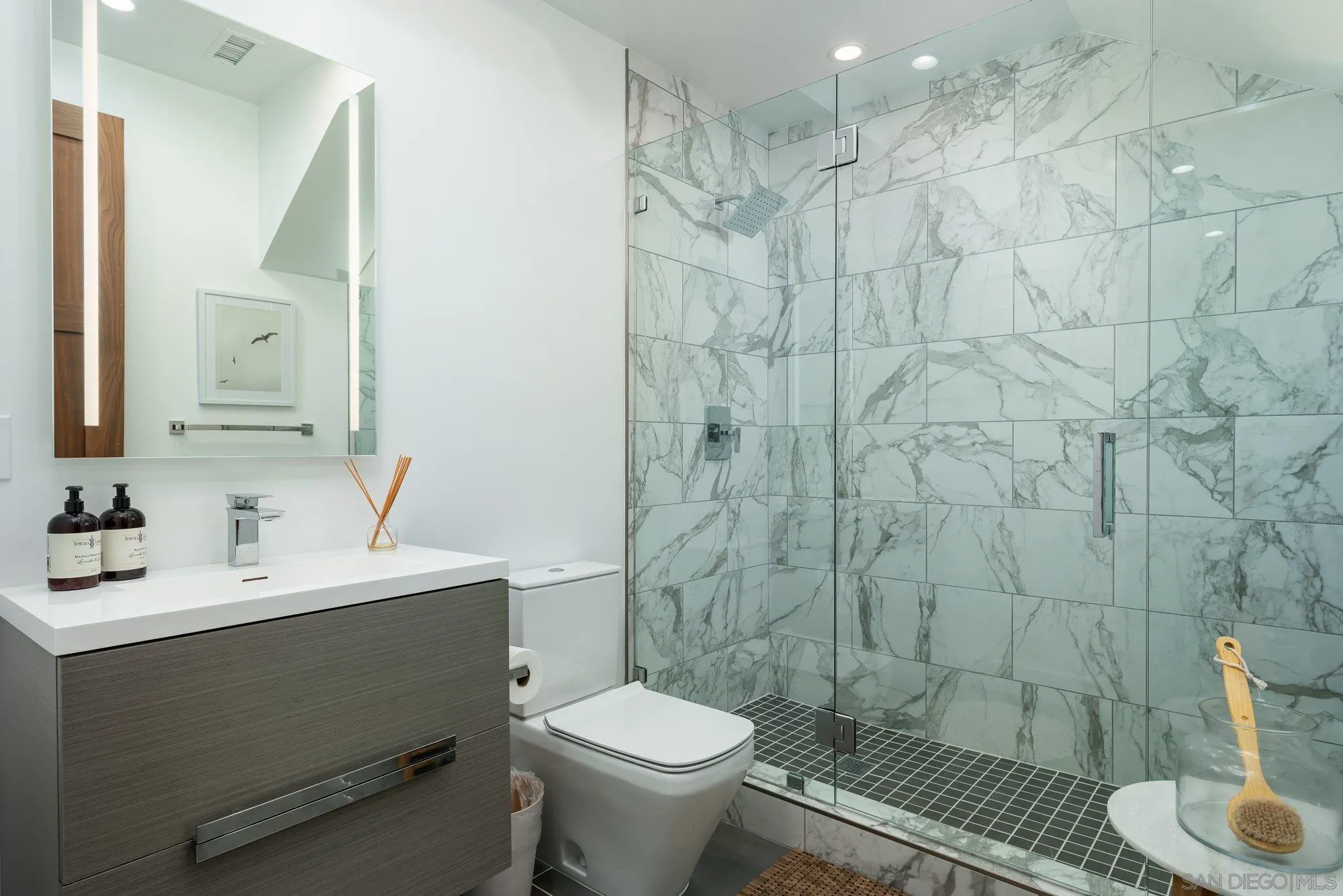 21 Green Turtle Road Coronado, CA 92118 - Photo 24 of 55 a bathroom with a sink toilet and shower