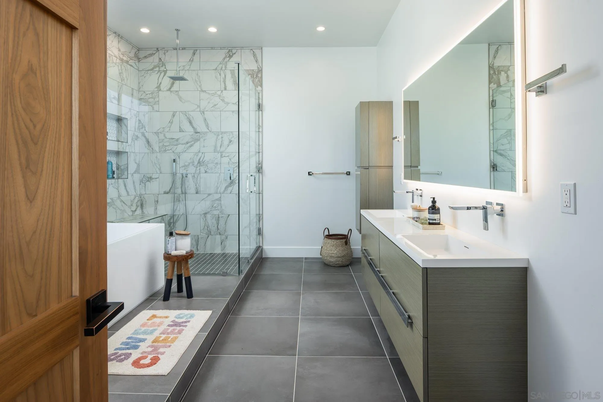 21 Green Turtle Road Coronado, CA 92118 - Photo 35 of 55 a bathroom with a double vanity sink mirror and shower