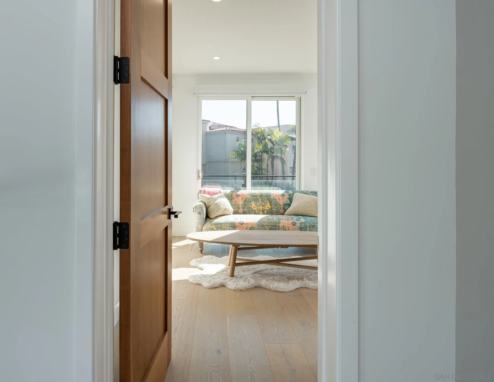 21 Green Turtle Road Coronado, CA 92118 - Photo 40 of 55 a living room with furniture and a large window