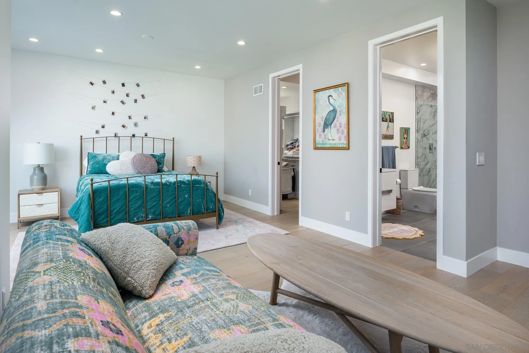 21 Green Turtle Road Coronado, CA 92118 - Photo 42 of 55 a bedroom with furniture and a wooden floor