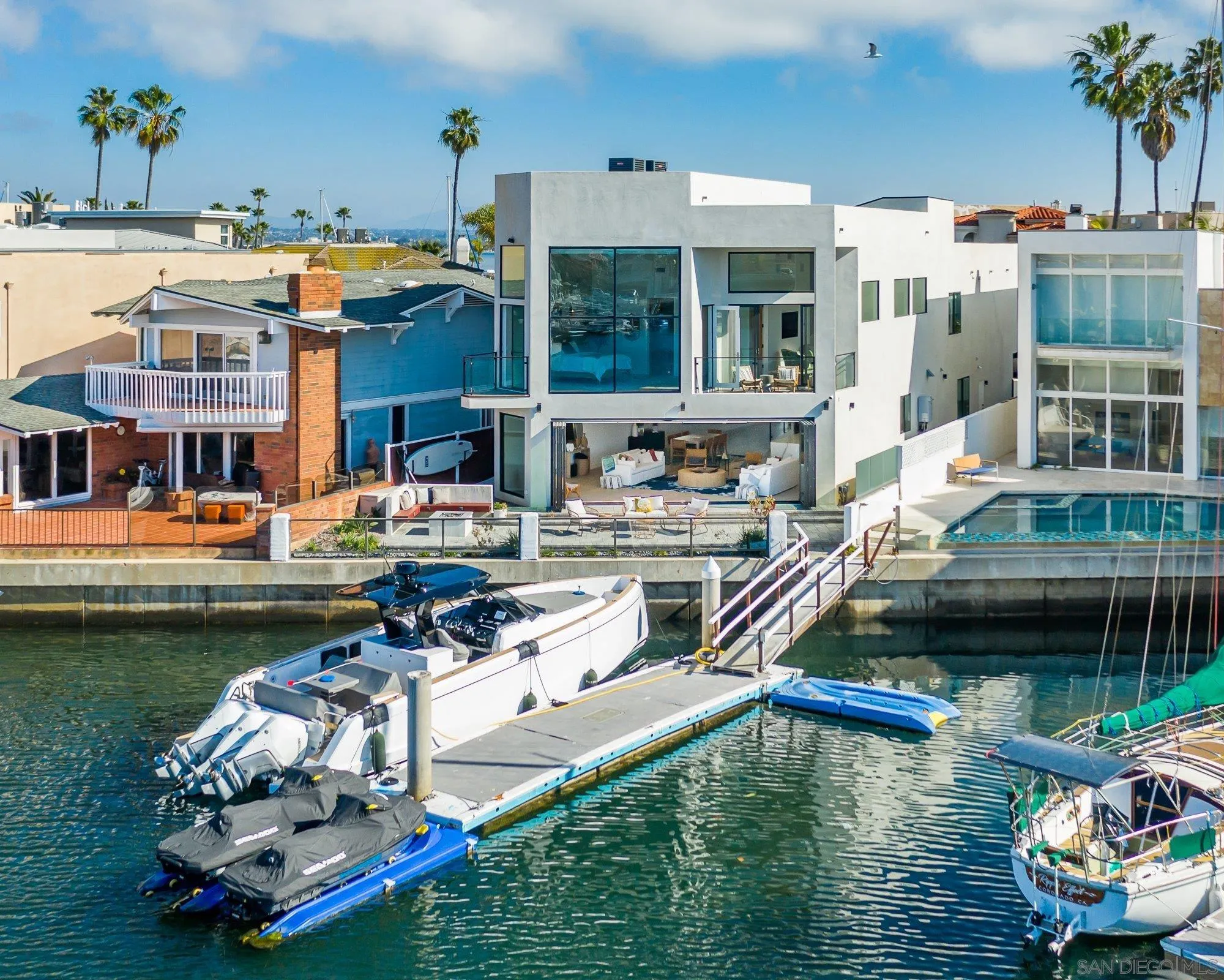 21 Green Turtle Road Coronado, CA 92118 - Photo 50 of 55 a swimming pool view with a seating space and a garden view