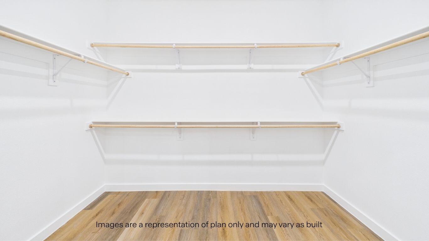 7010 53rd Street Lubbock, TX 79407 - Photo 22 of 33 a view of a room with racks on the wall