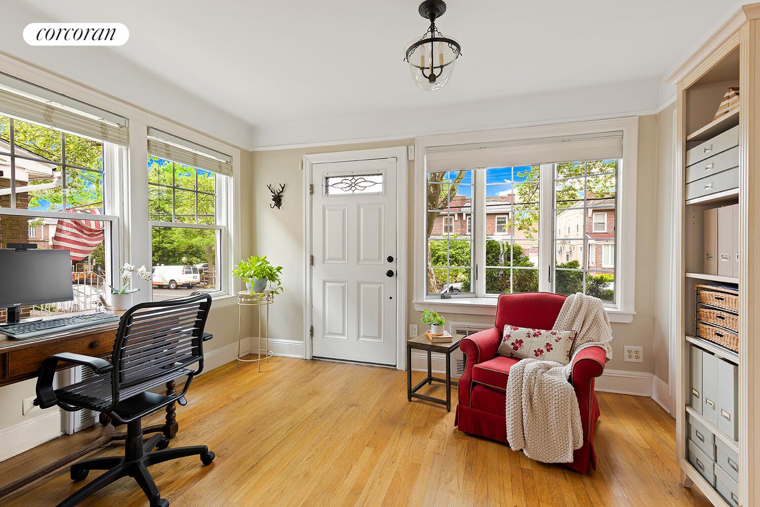7709 Colonial Road Brooklyn, NY 11209 - Photo 3 of 13 a living room with furniture and a window