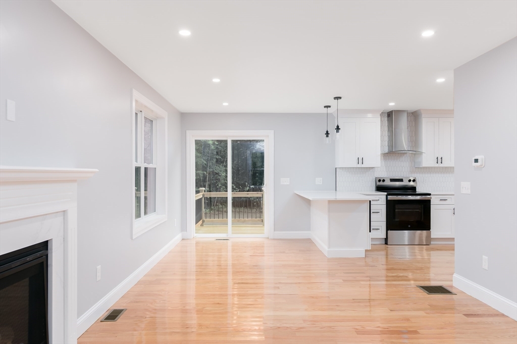 36 Hiland Road Charlton, MA 01507 - Photo 11 of 38 a kitchen with stainless steel appliances granite countertop a stove a sink and a refrigerator
