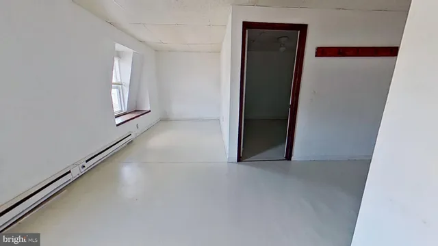 an empty room with windows