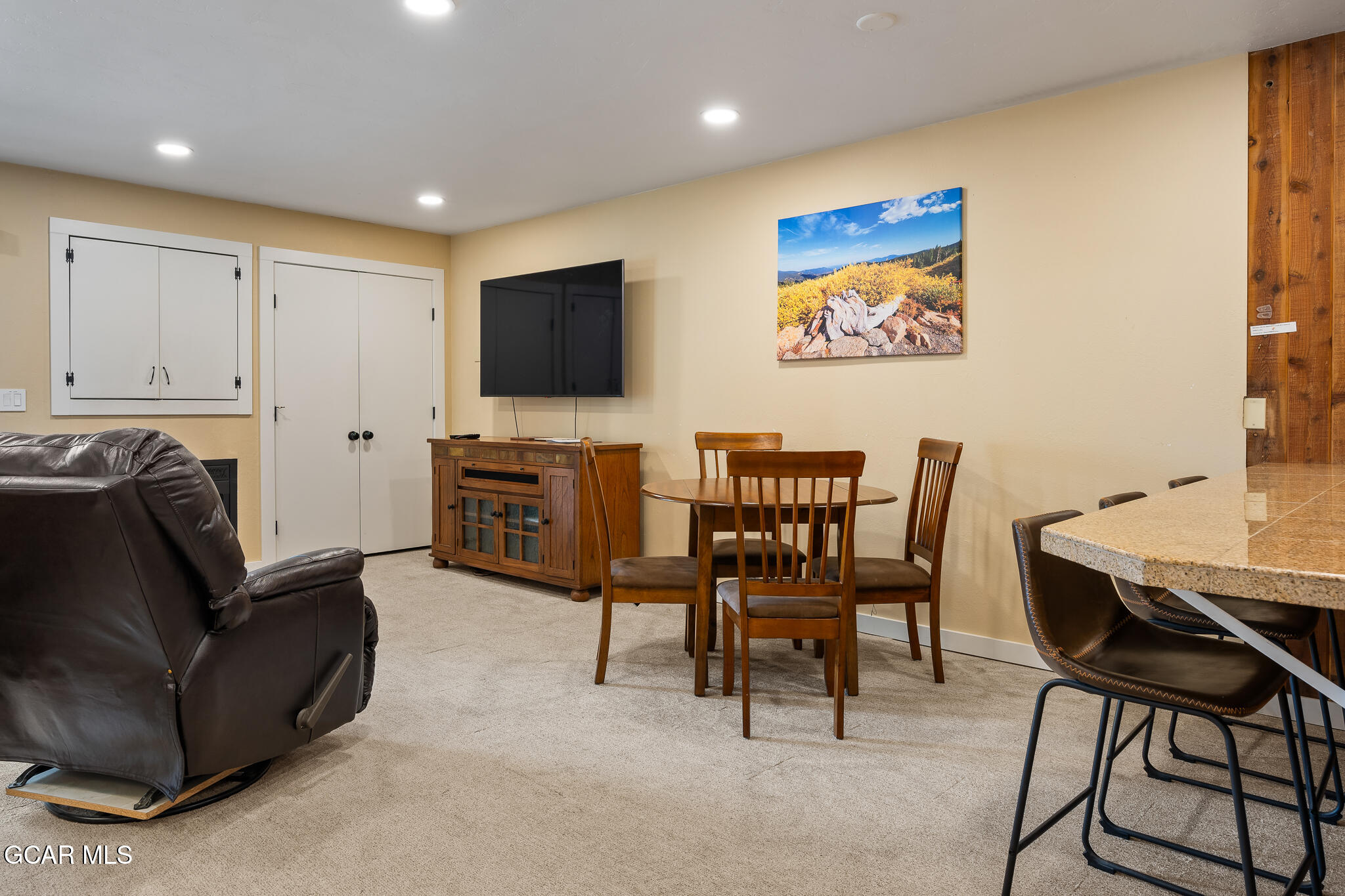490 Kings Crossing Road, Unit 611 Winter Park, CO 80482 - Photo 12 of 39 a view of a livingroom with furniture and a flat screen tv
