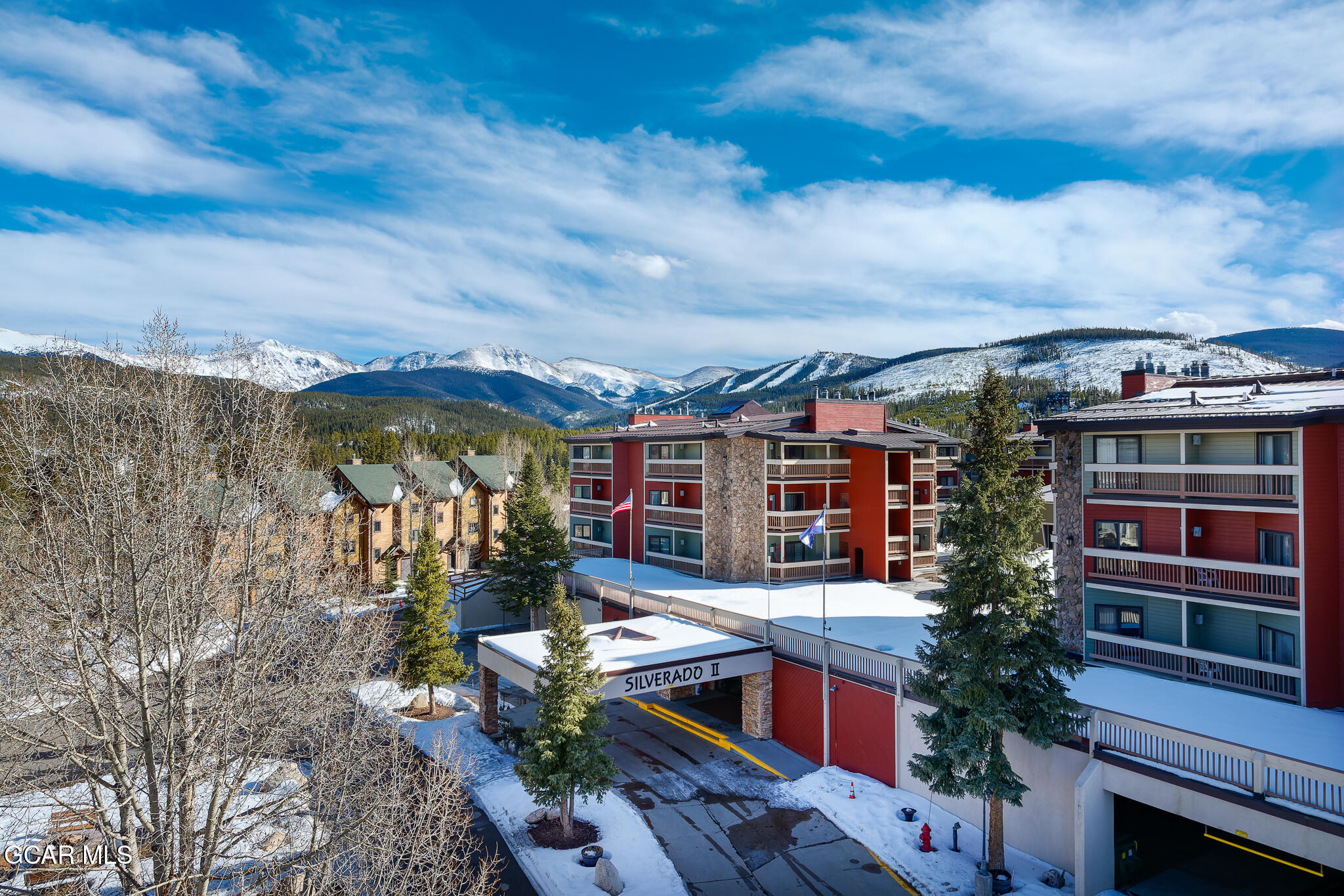 490 Kings Crossing Road, Unit 611 Winter Park, CO 80482 - Photo 3 of 39 a view of houses with cars parked