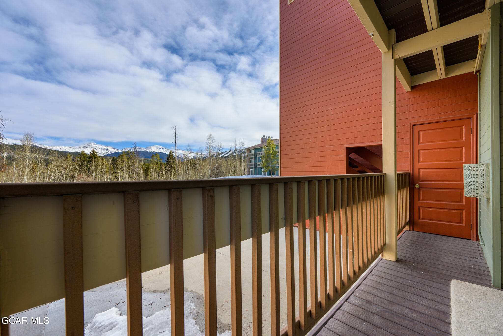 490 Kings Crossing Road, Unit 611 Winter Park, CO 80482 - Photo 36 of 39 a view of a balcony with wooden fence