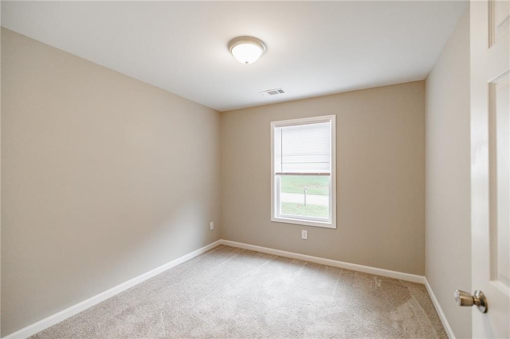 103 Three Rivers Court Hull, GA 30646 - Photo 31 of 40 an empty room with a window