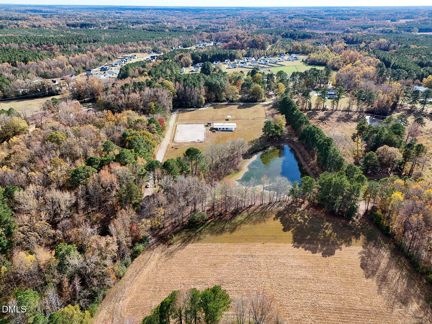 9637 Earpsboro Chamblee Road Zebulon, NC 27597 - Photo 7 of 42 an aerial view of a house with a yard