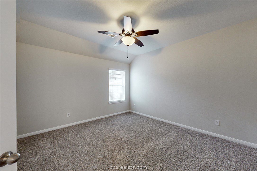 5764 Paseo Place Bryan, TX 77807 - Photo 26 of 35 Secondary bedroom on the right.