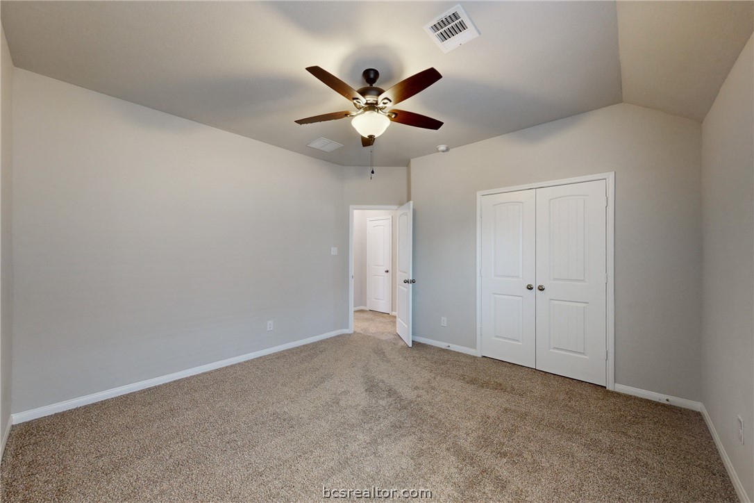 5764 Paseo Place Bryan, TX 77807 - Photo 27 of 35 Linen closet in the hallway through the doorway that serves the upstairs floor.