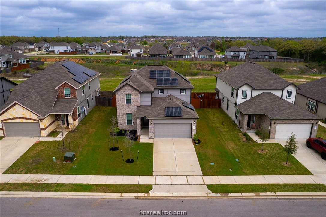 5764 Paseo Place Bryan, TX 77807 - Photo 31 of 35 Aerial view of the front of the home.