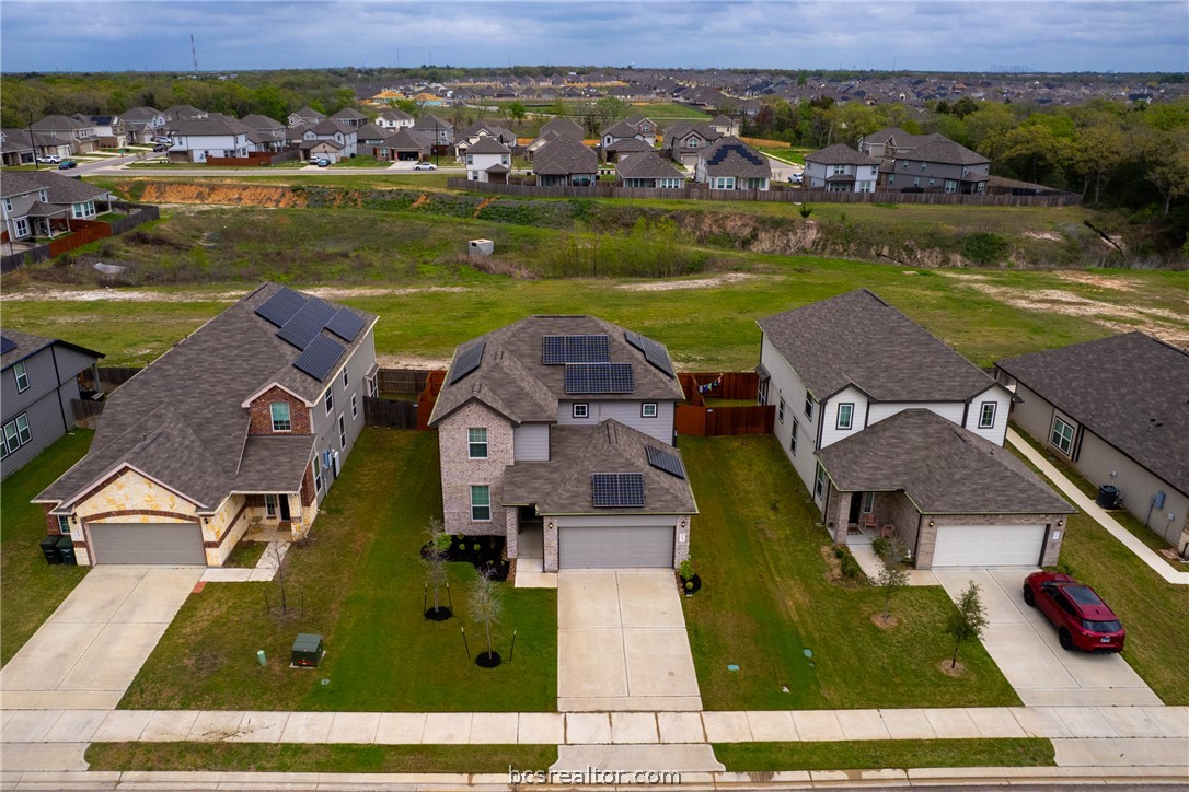 5764 Paseo Place Bryan, TX 77807 - Photo 32 of 35 Aerial picture showing the green area behind the house.
