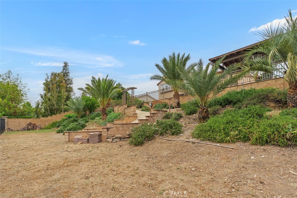 13337 Hunt Club Drive Rancho Cucamonga, CA 91739 - Photo 43 of 45 Rear expansive lot with utility setup for potential future additions