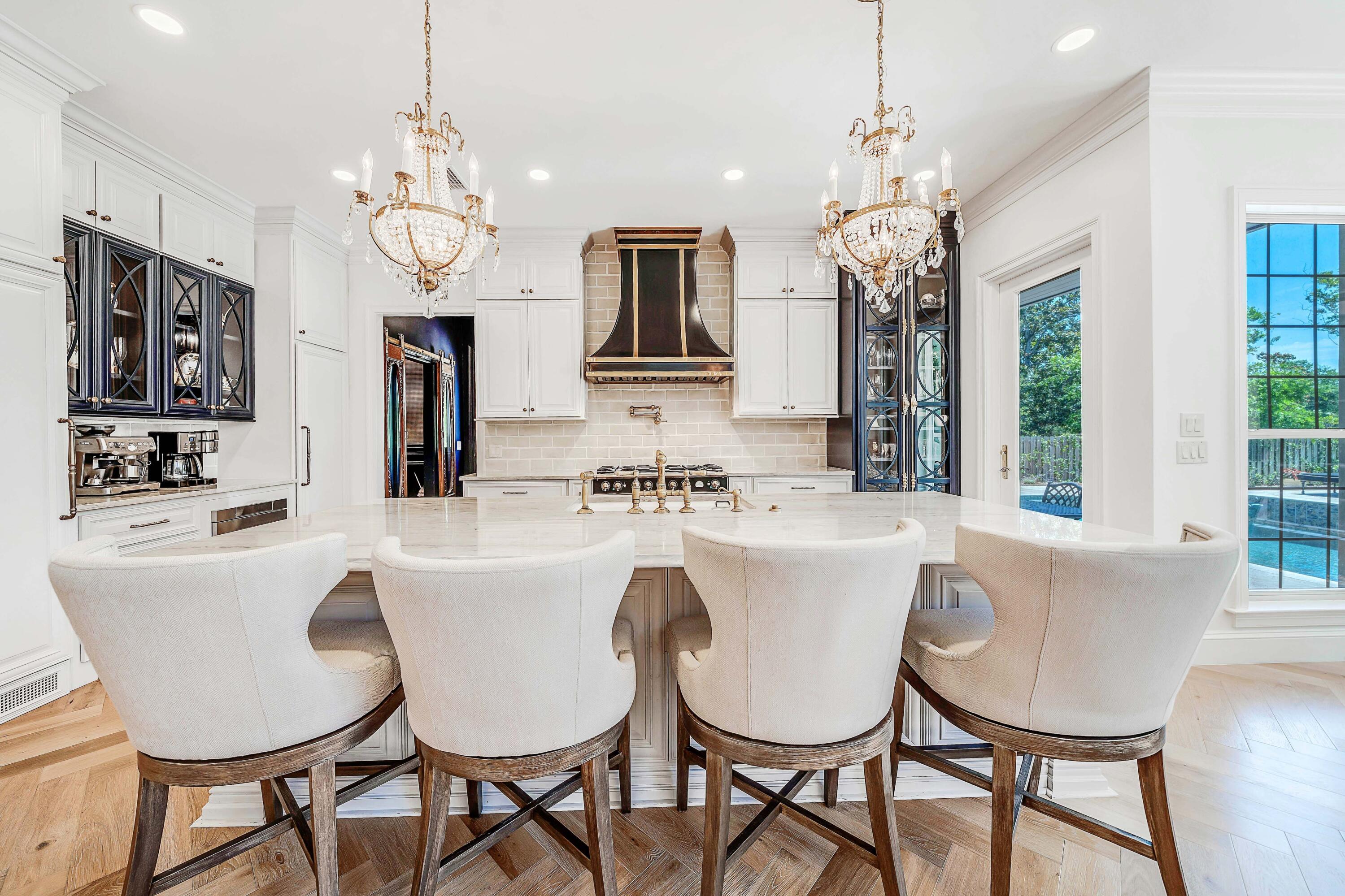 3417 Dragon's Ridge Road Panama City Beach, FL 32408 - Photo 21 of 69 a large dining room with furniture a chandelier and window