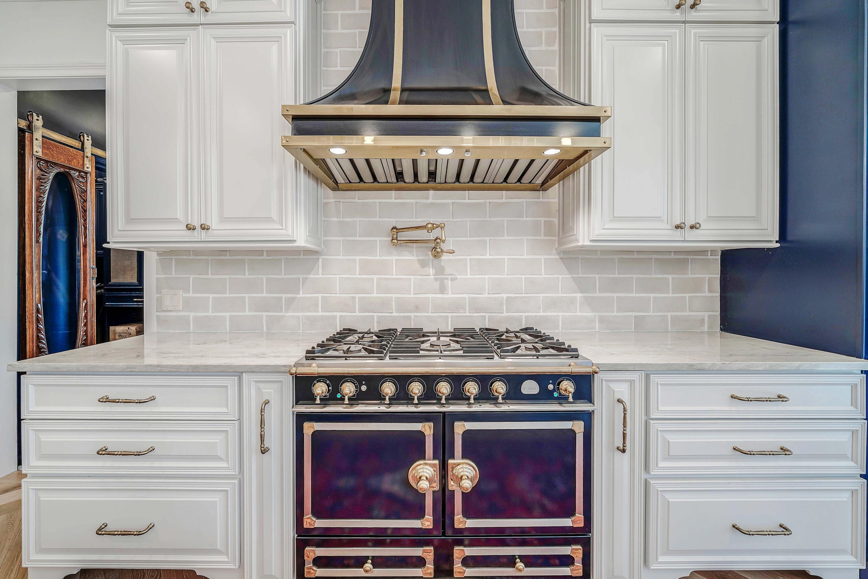 3417 Dragon's Ridge Road Panama City Beach, FL 32408 - Photo 23 of 69 a stove top oven sitting inside of a kitchen