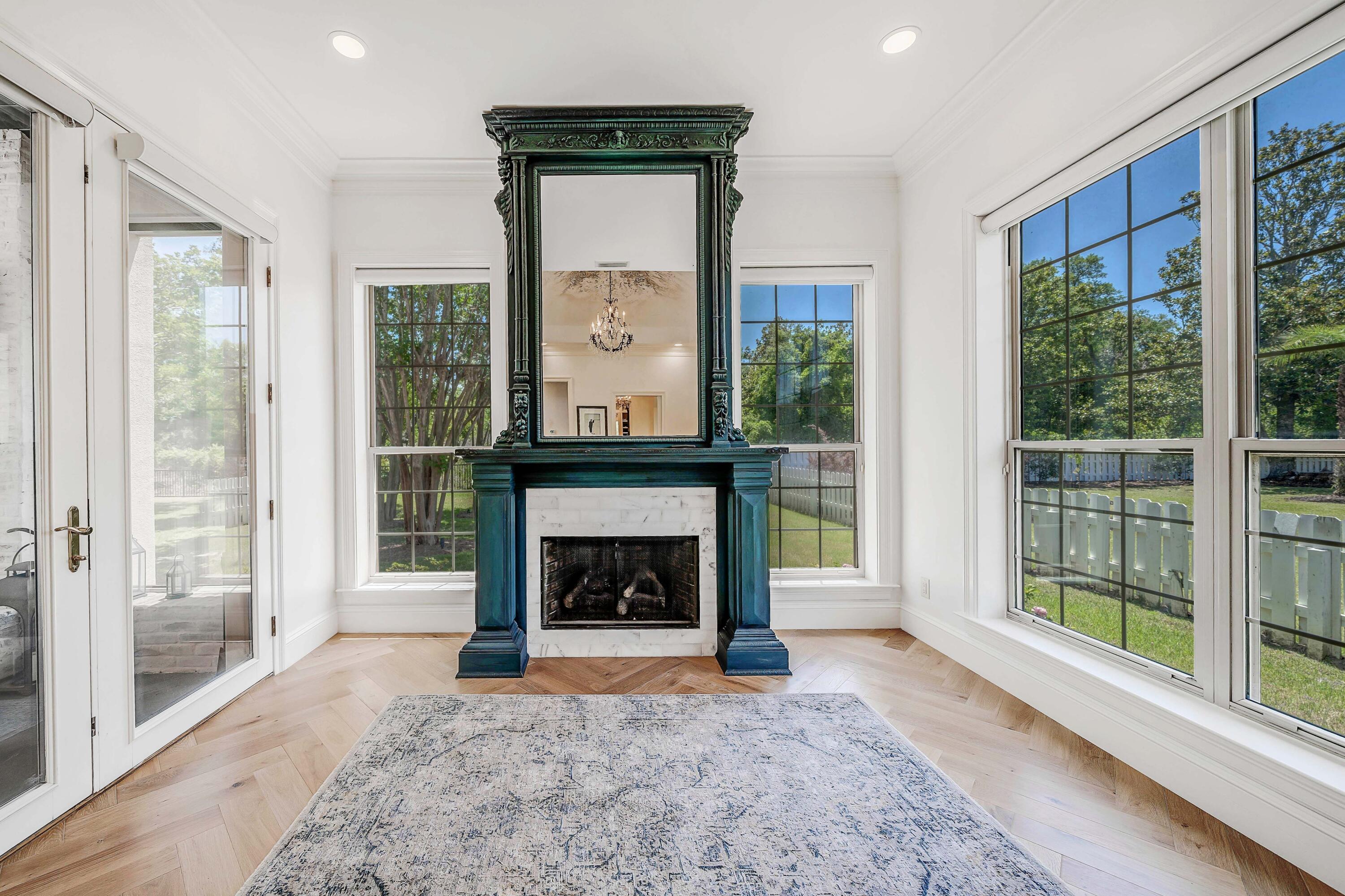 3417 Dragon's Ridge Road Panama City Beach, FL 32408 - Photo 33 of 69 a living room with furniture and a fireplace