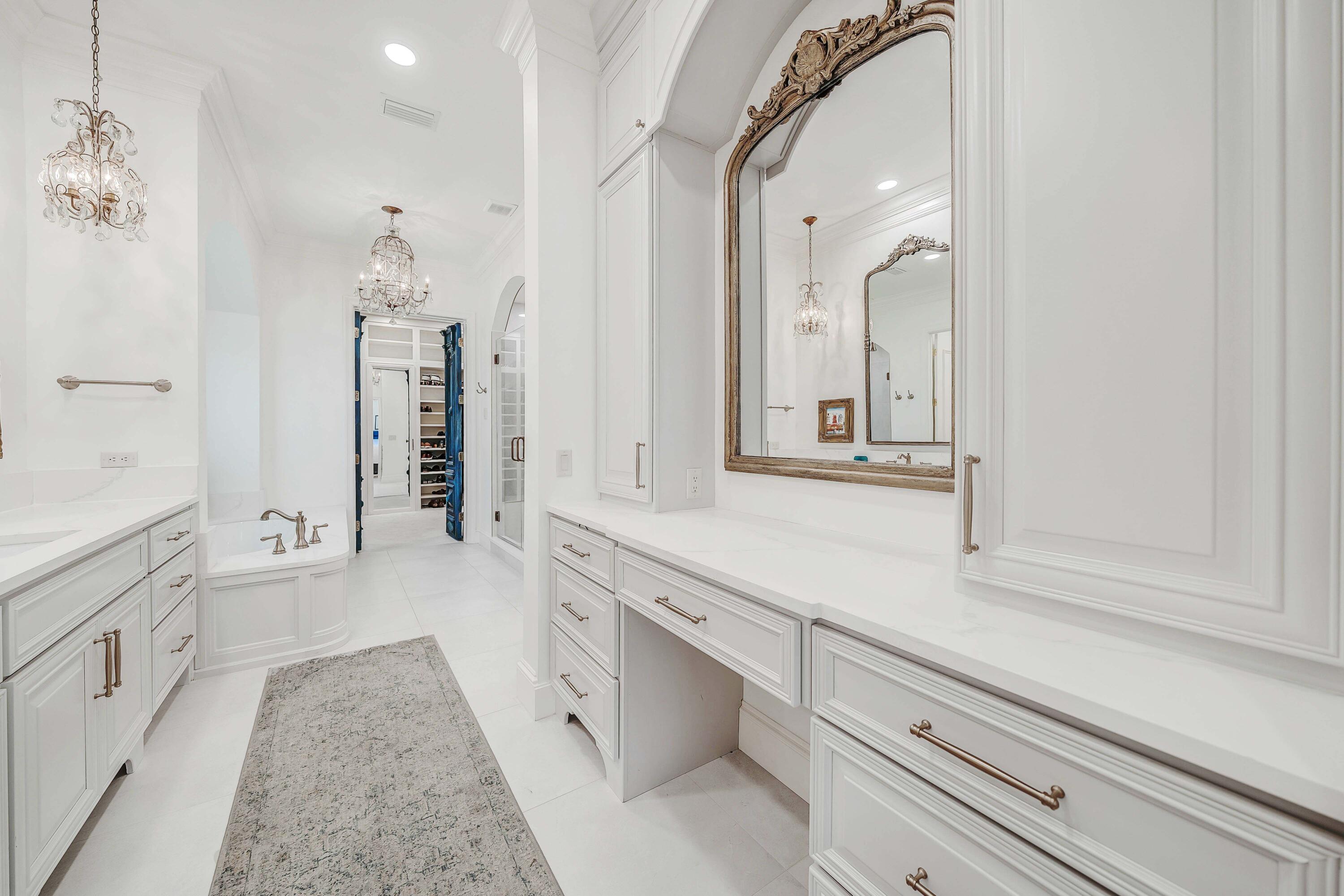 3417 Dragon's Ridge Road Panama City Beach, FL 32408 - Photo 35 of 69 a spacious bathroom with a tub sink and mirror