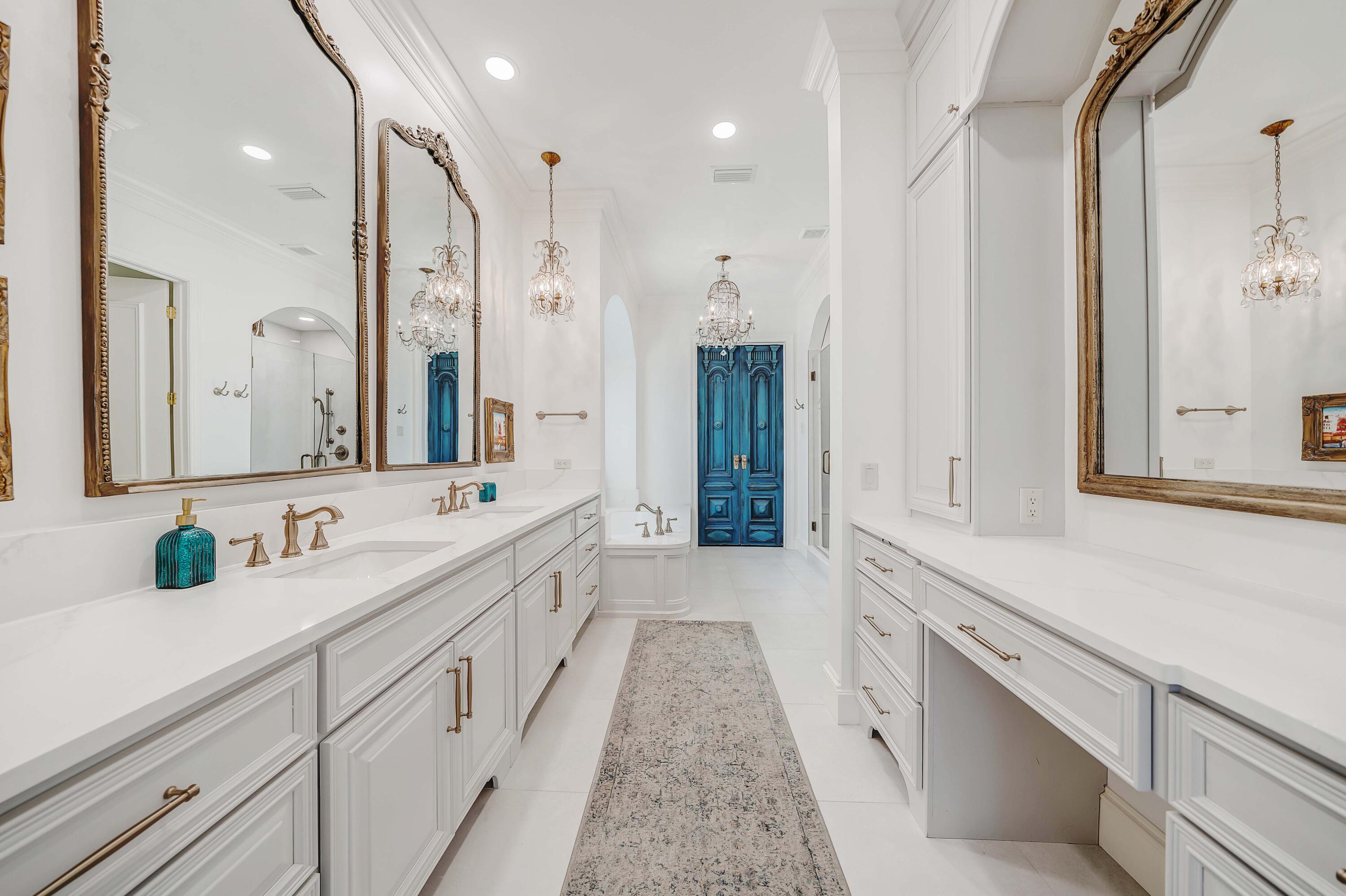 3417 Dragon's Ridge Road Panama City Beach, FL 32408 - Photo 36 of 69 a spacious bathroom with double vanity and mirrors