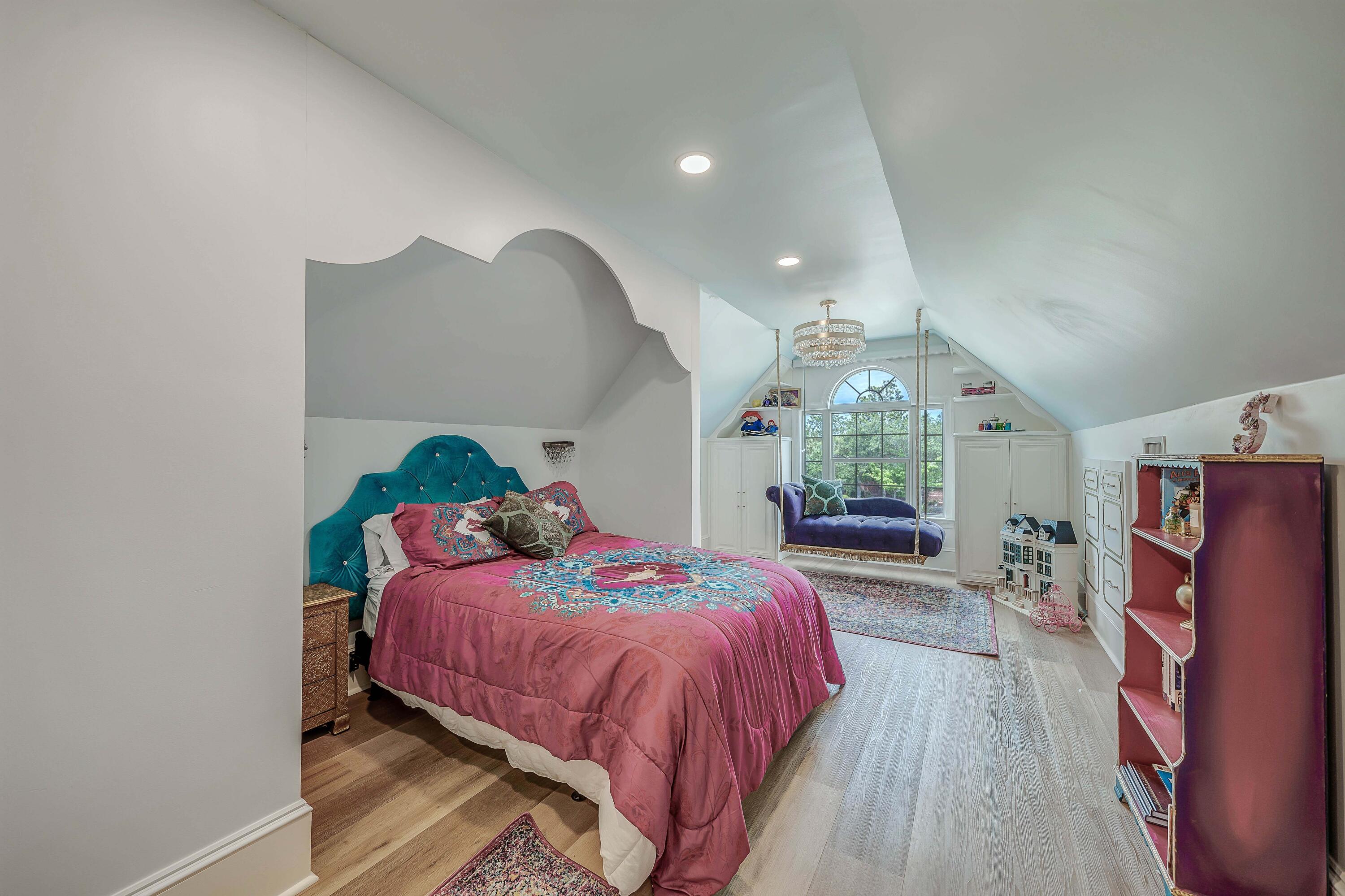 3417 Dragon's Ridge Road Panama City Beach, FL 32408 - Photo 45 of 69 a bedroom with a bed and a mirror