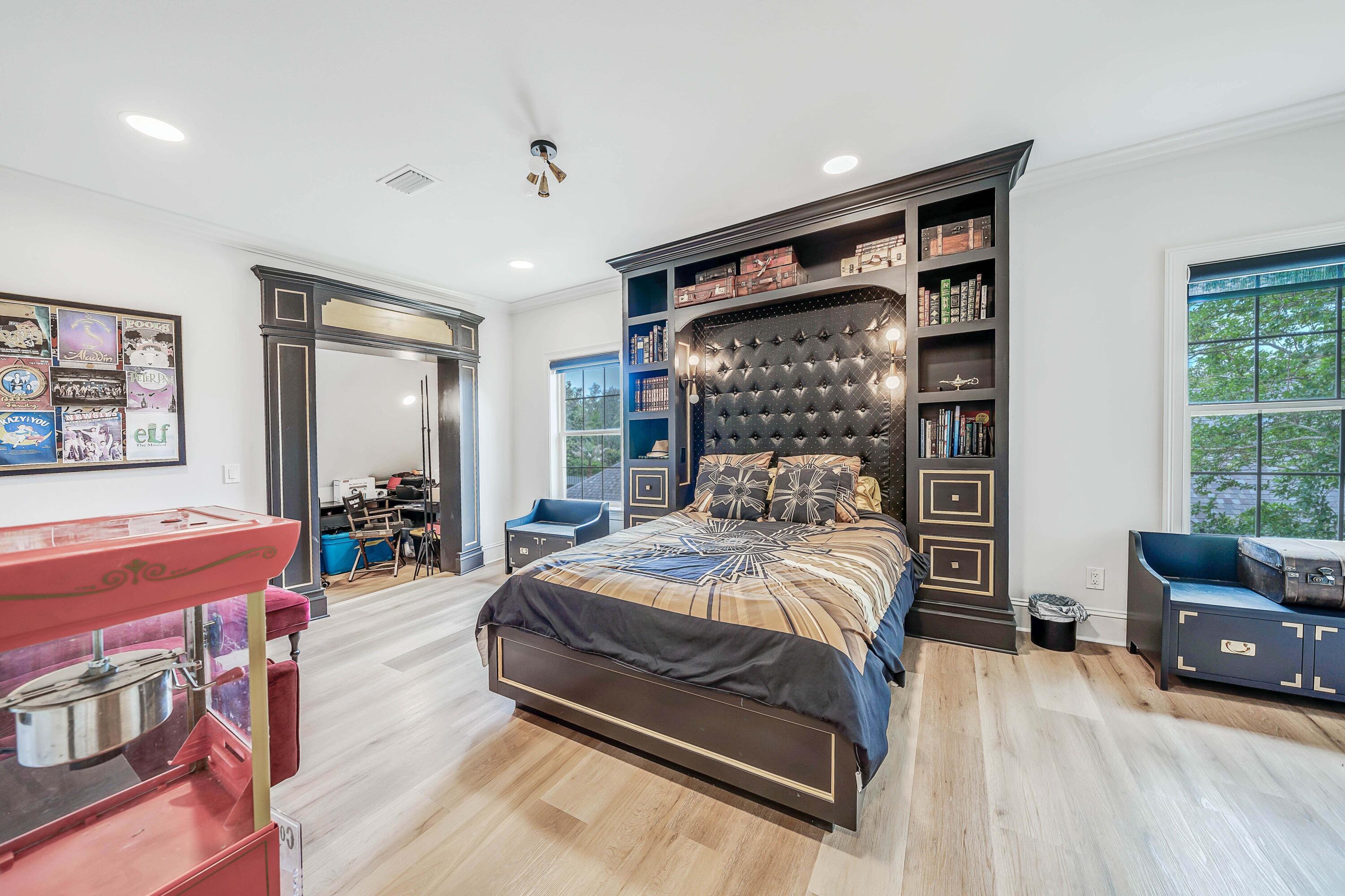 3417 Dragon's Ridge Road Panama City Beach, FL 32408 - Photo 50 of 69 a bedroom with a bed couch and a large window