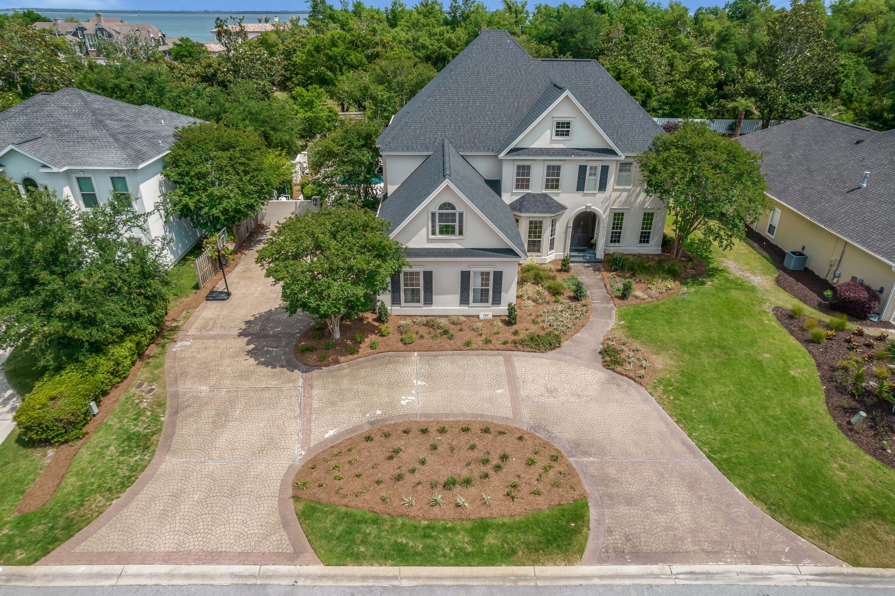3417 Dragon's Ridge Road Panama City Beach, FL 32408 - Photo 68 of 69 an aerial view of a house with a garden