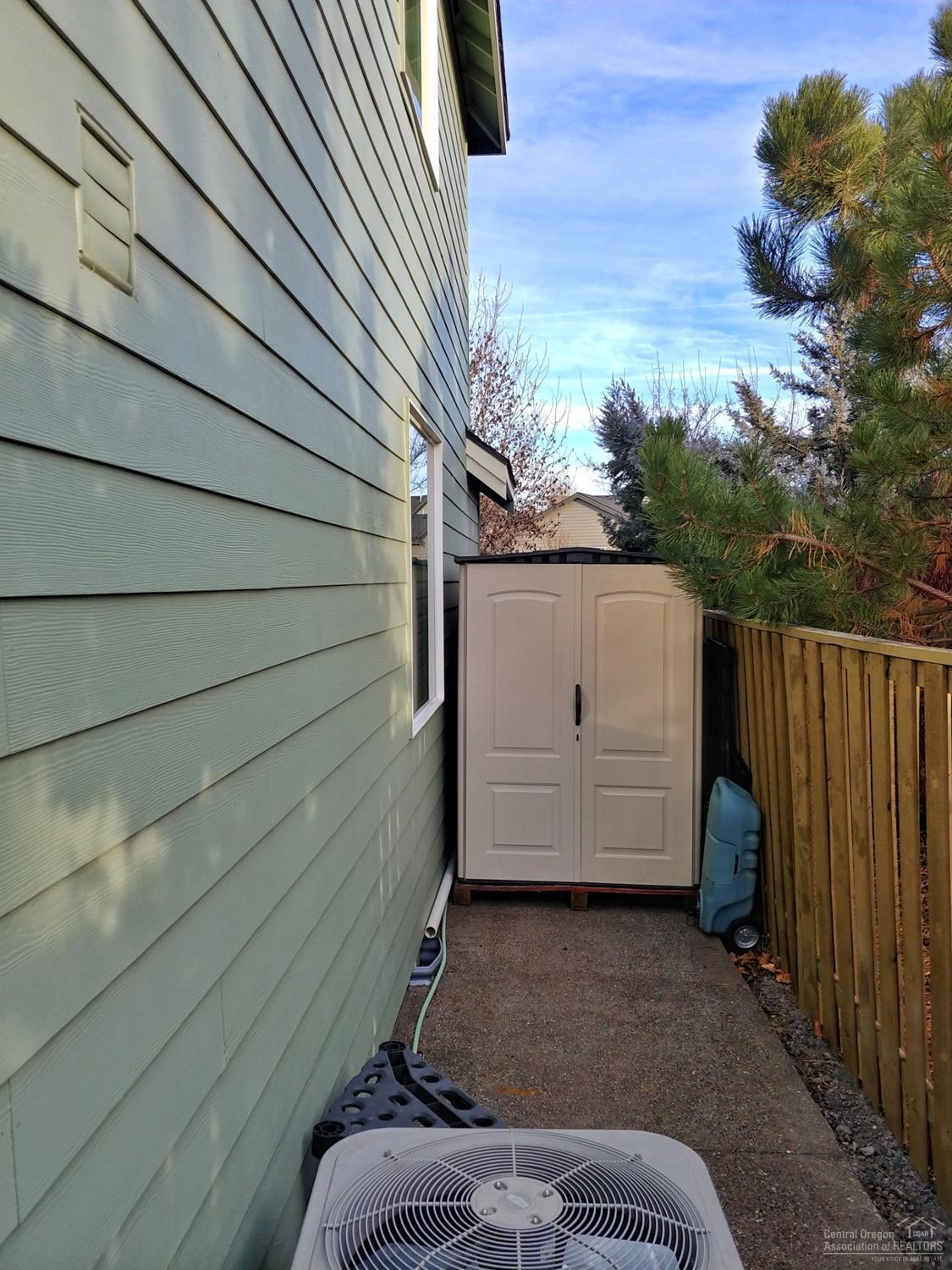 2903 Southwest 50th Street Redmond, OR 97756 - Photo 22 of 24 Storage space on south side of home.