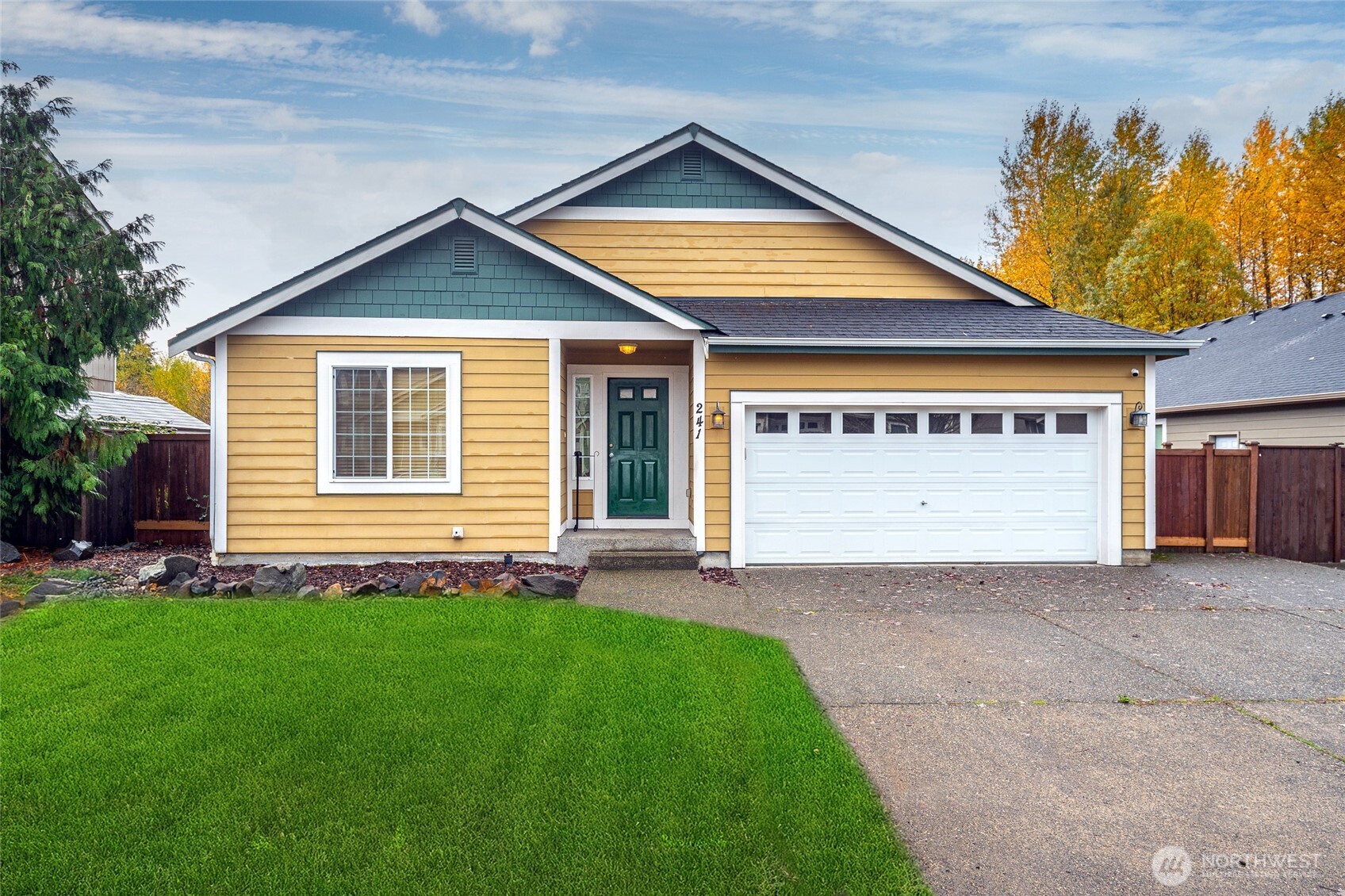 241 Parkside Loop Napavine, WA 98532 - Photo 2 of 34 a view of front of a house with a yard and garage