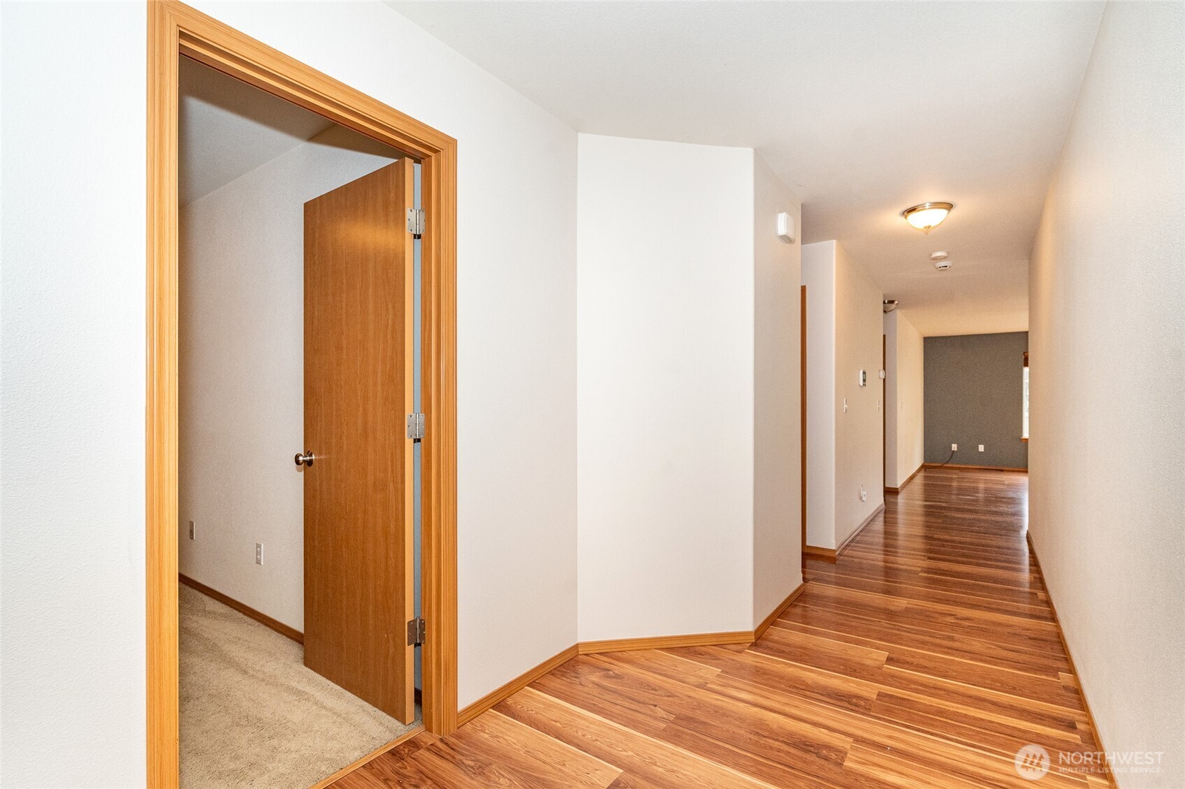 241 Parkside Loop Napavine, WA 98532 - Photo 3 of 34 a view of a hallway with wooden floor