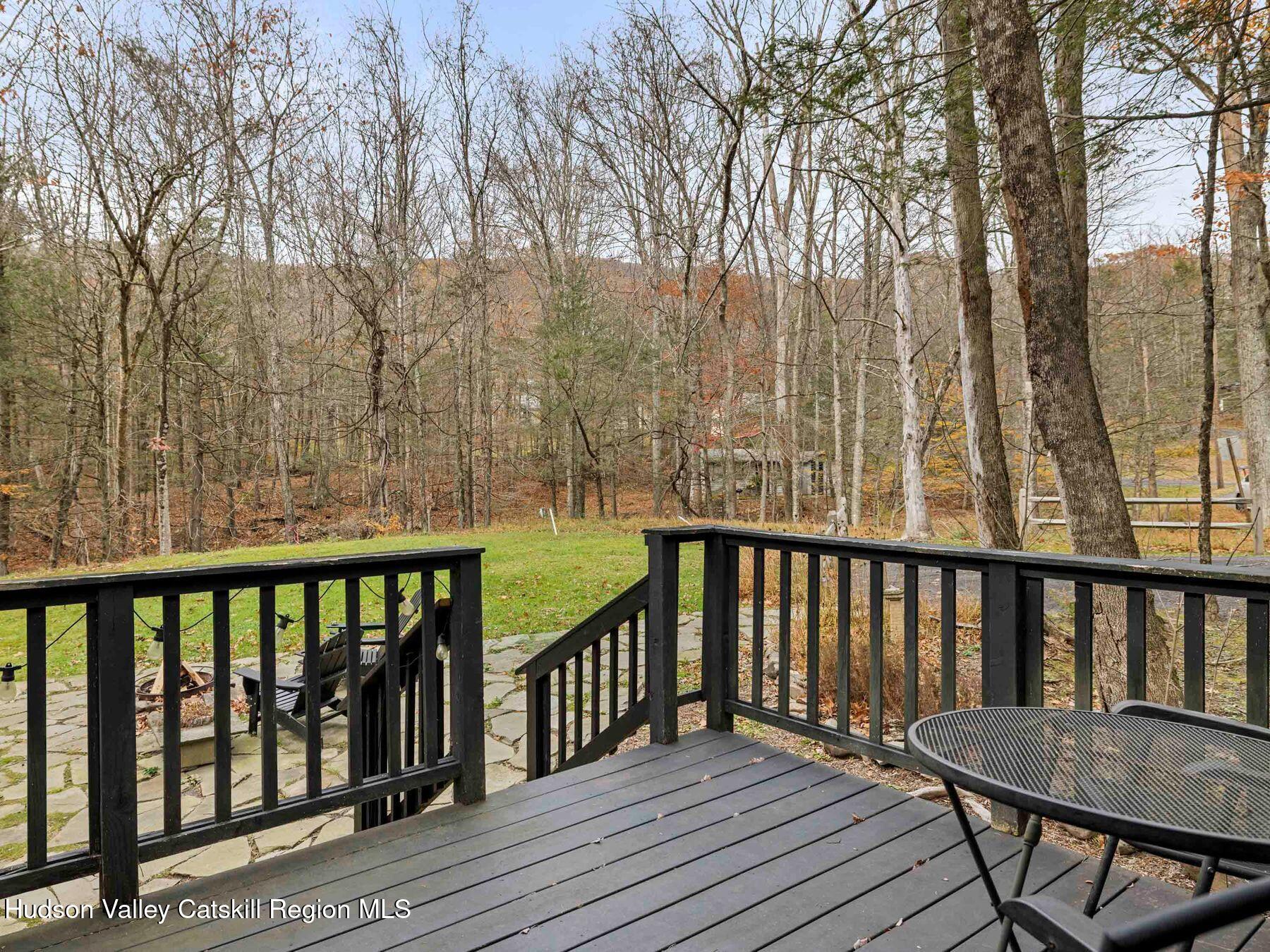 259 Silver Hollow Road Willow, NY 12495 - Photo 2 of 28 a view of balcony with wooden floor and outdoor seating