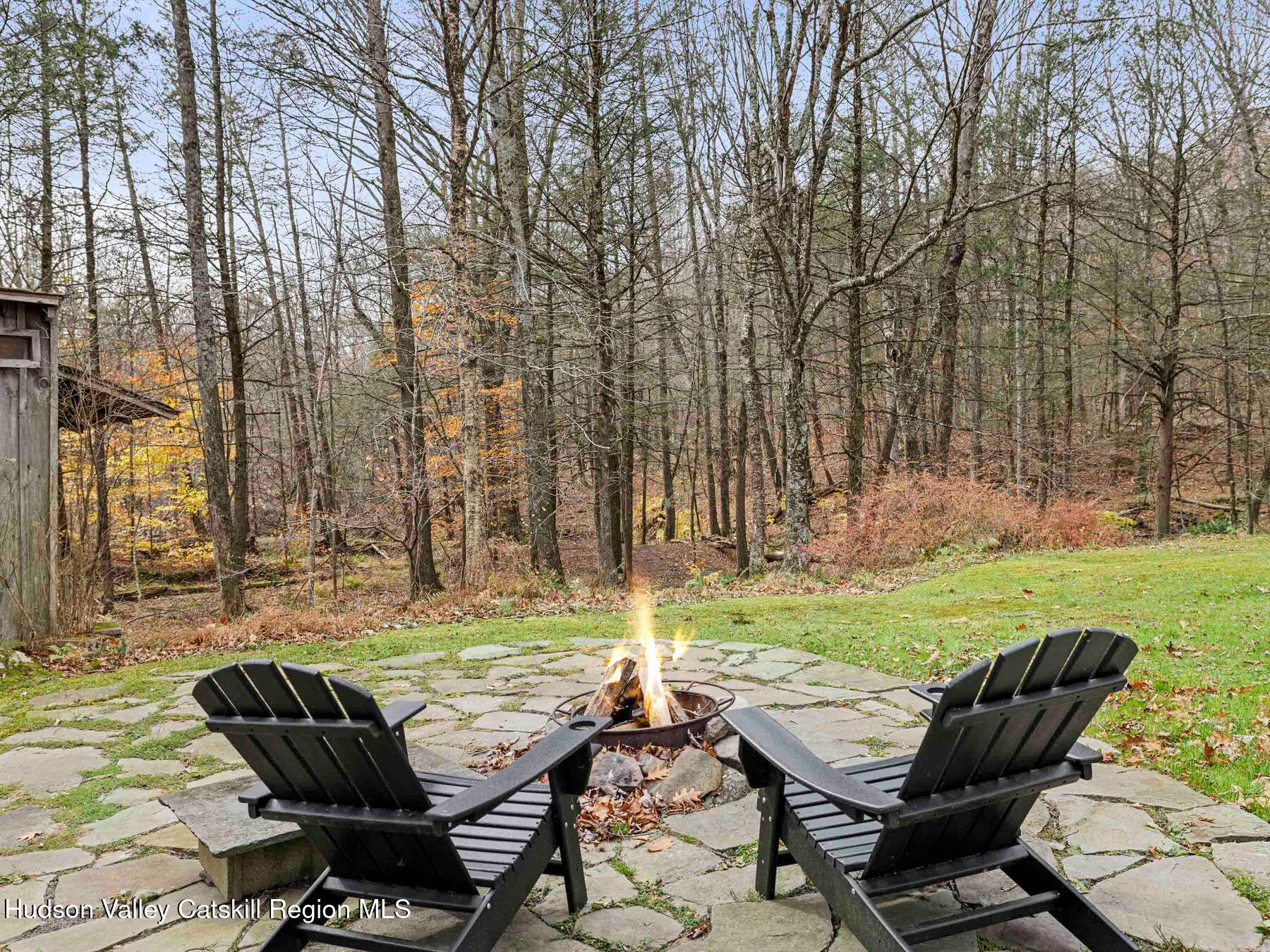 259 Silver Hollow Road Willow, NY 12495 - Photo 26 of 28 a backyard of a house with outdoor seating