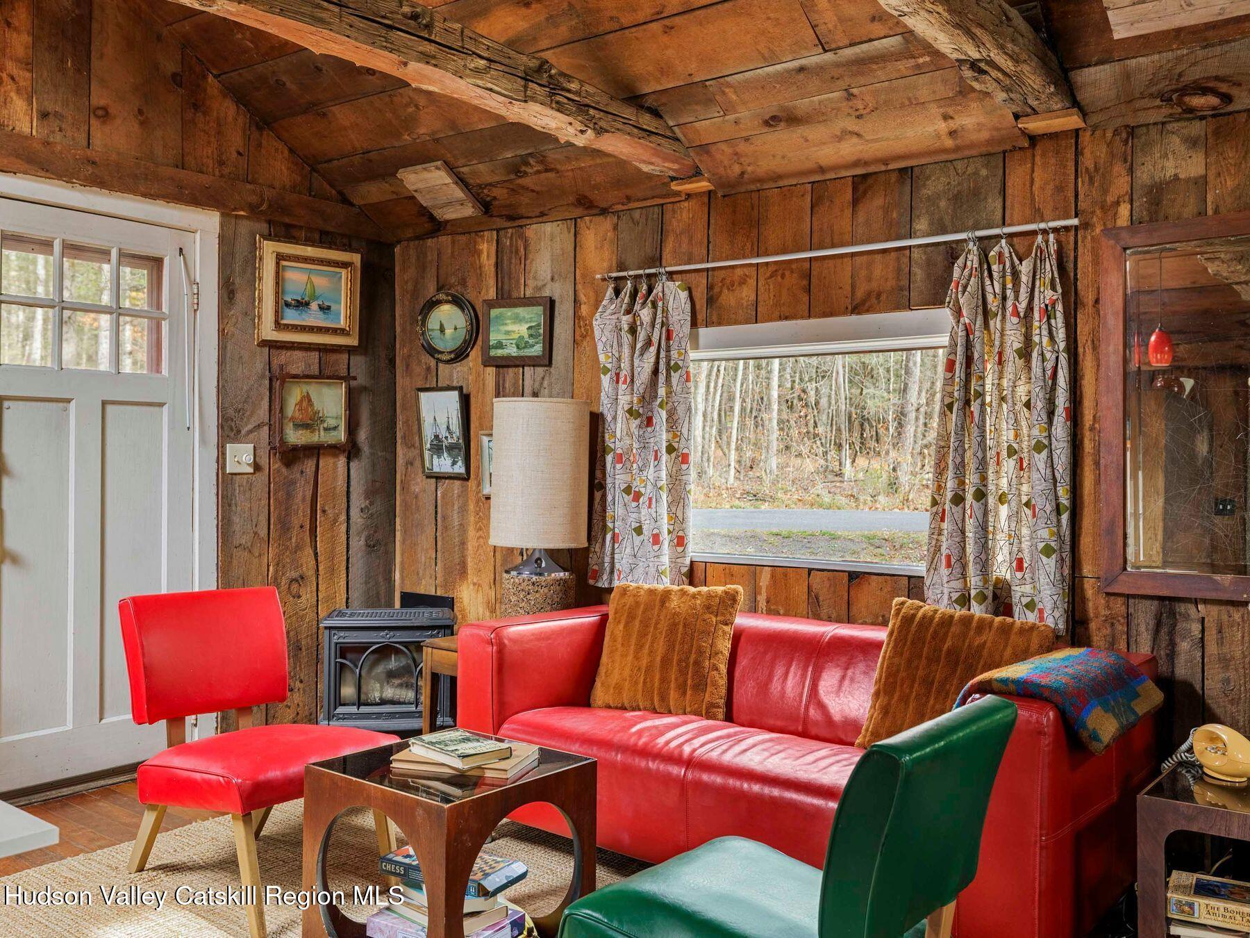 259 Silver Hollow Road Willow, NY 12495 - Photo 6 of 28 a living room with furniture and a window