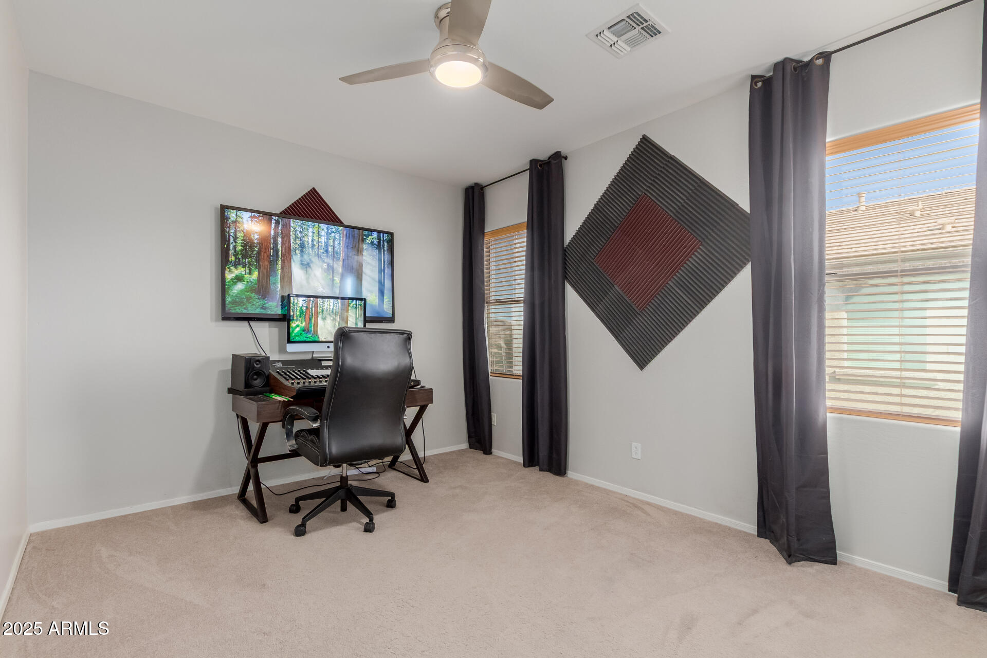 45247 West Jack Rabbit Trail Maricopa, AZ 85139 - Photo 27 of 46 a work room with furniture and a window