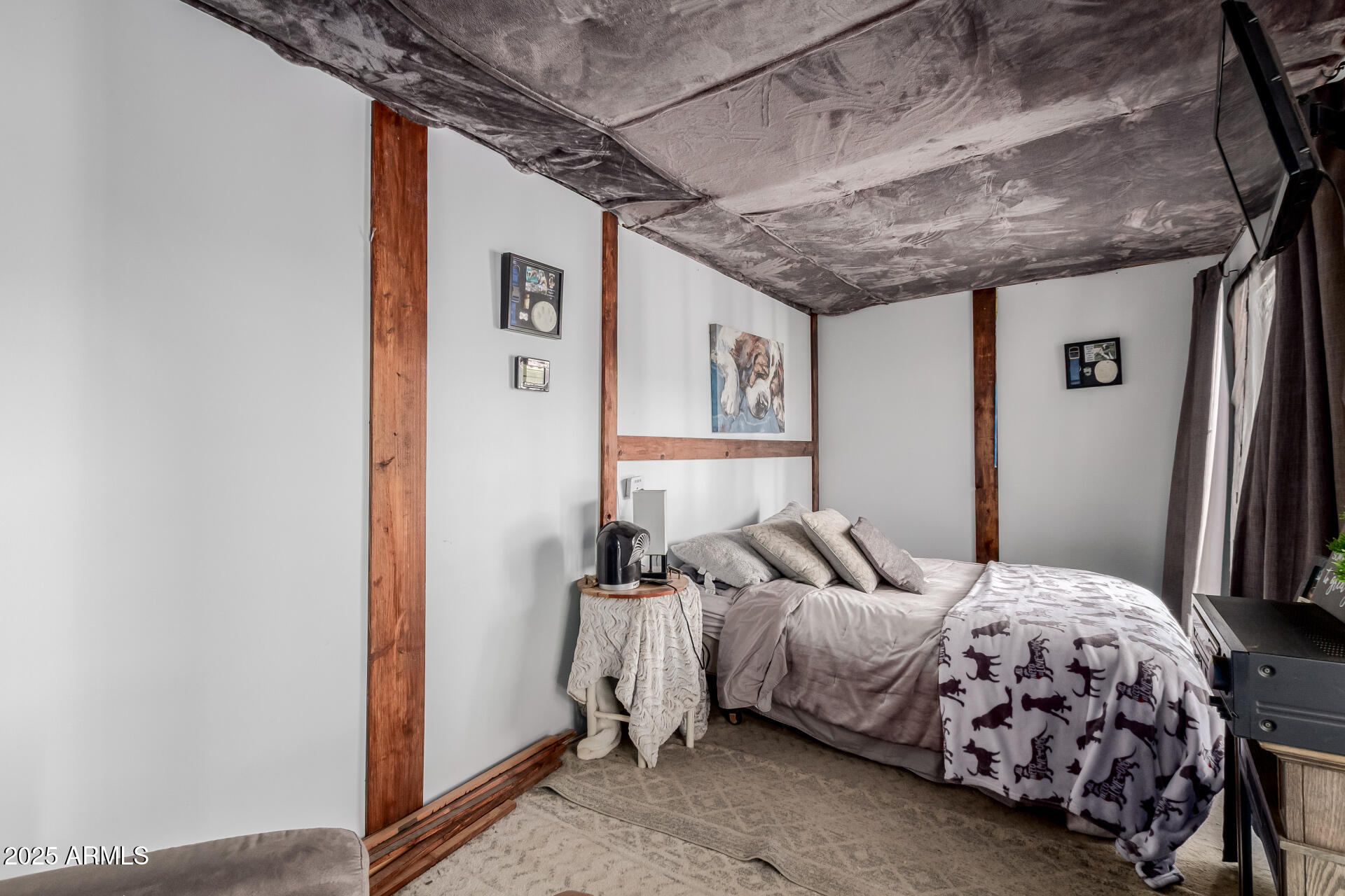 45247 West Jack Rabbit Trail Maricopa, AZ 85139 - Photo 36 of 46 a bedroom with a bed and a mirror