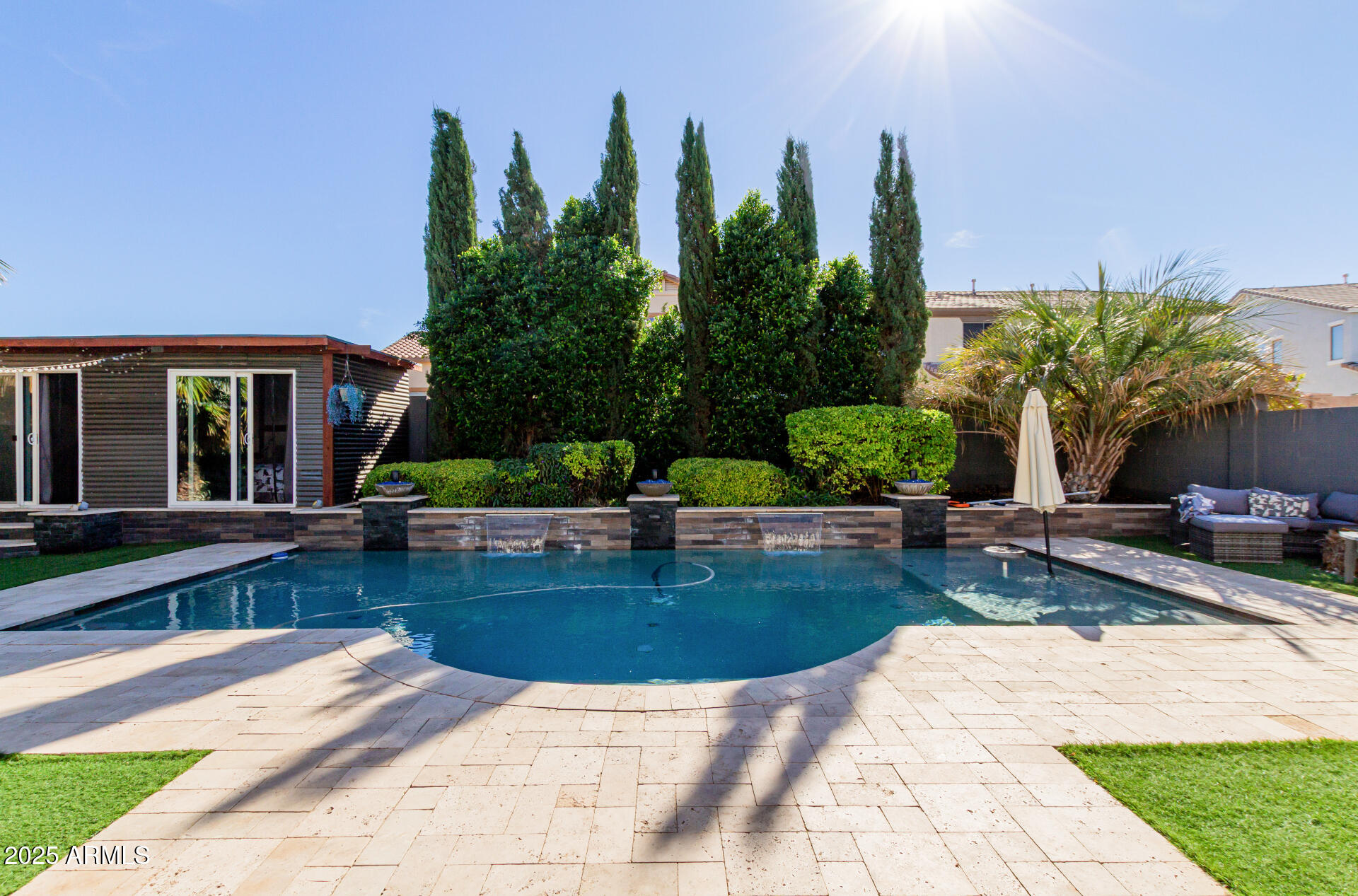 45247 West Jack Rabbit Trail Maricopa, AZ 85139 - Photo 41 of 46 a view of a house with backyard and sitting area