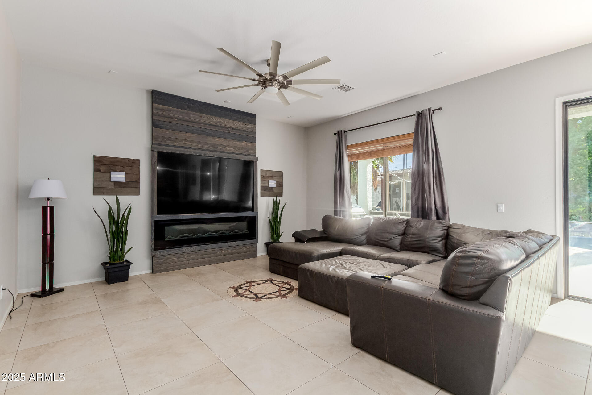 45247 West Jack Rabbit Trail Maricopa, AZ 85139 - Photo 7 of 46 a living room with furniture and a window