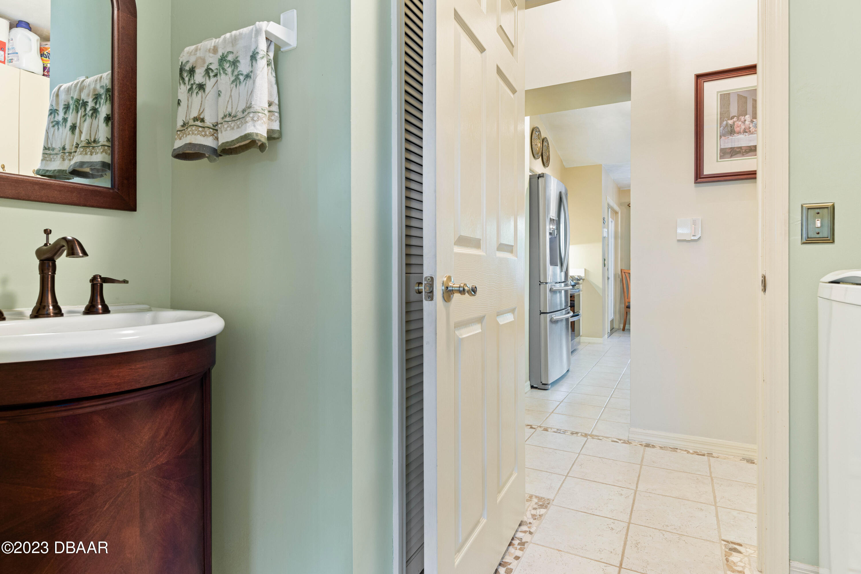 54 Kingsley Circle Ormond Beach, FL 32174 - Photo 53 of 76 Vanity in Laundry Room