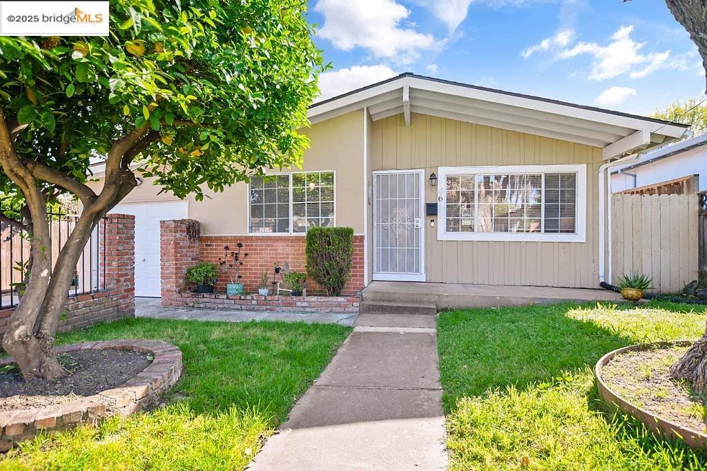 46 Virginia Drive Bay Point, CA 94565 - Photo 1 of 1 a front view of house with yard and green space