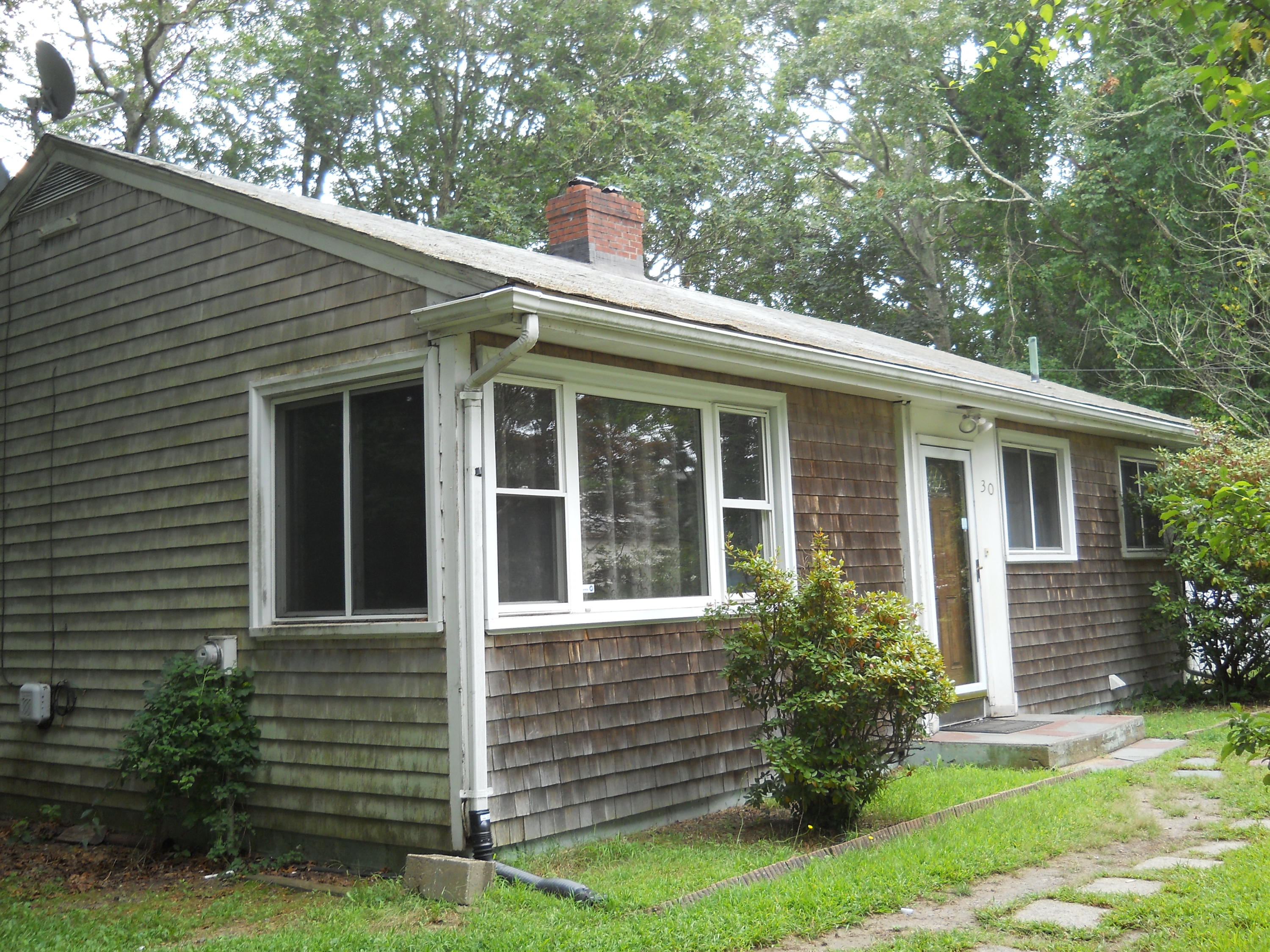 30 Dunns Pond Road Hyannis, MA 02601 - Photo 3 of 30 front view of a house with a yard