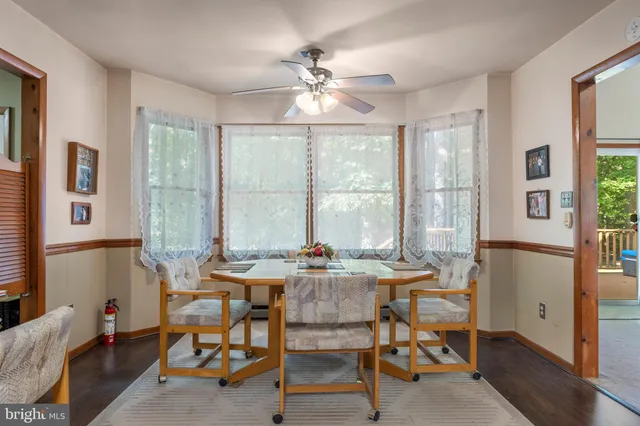 a view of storage and utility room with a window