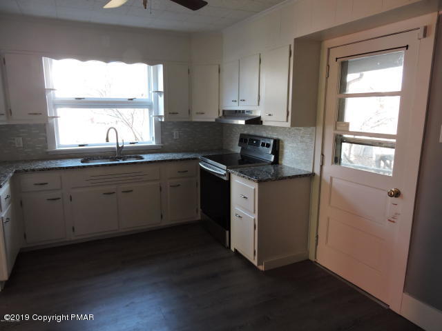 17 Fetherman Street Stroudsburg, PA 18360 - Photo 7 of 20 Kitchen Rear Entry To Deck w Storage