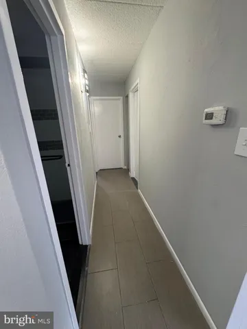 a view of hallway with stairs