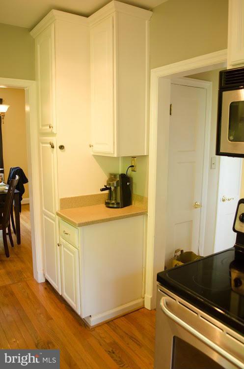514 Windwood Road Baltimore, MD 21212 - Photo 11 of 18 a kitchen with a sink and cabinets