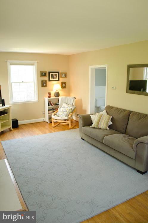 514 Windwood Road Baltimore, MD 21212 - Photo 4 of 18 a living room with furniture and a table