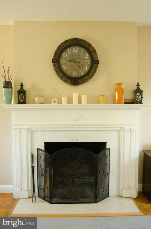 514 Windwood Road Baltimore, MD 21212 - Photo 5 of 18 a close view of a fireplace with wooden floor