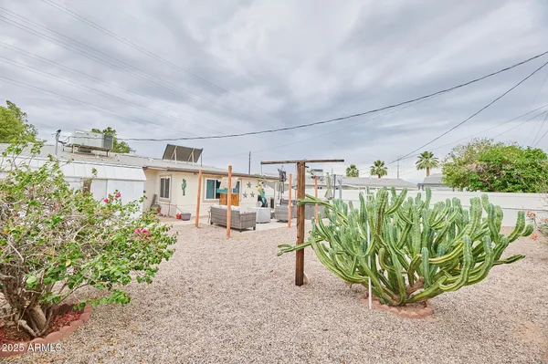 a view of a back yard of the house